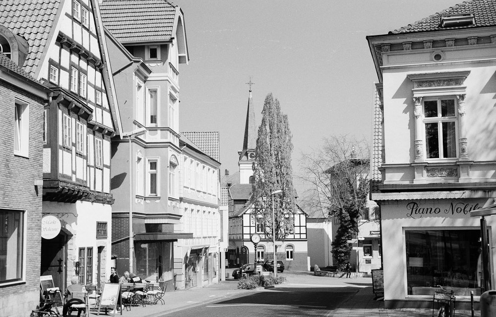   Leica IIIf with 5cm Summitar at f/5.6 and 1/500s, Kodak TMax 400 with hand-held orange filter in front of the lens  